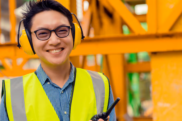 Smart asian engineer manager with safety uniform checking site construction with steel concrete structure background 609648 1602